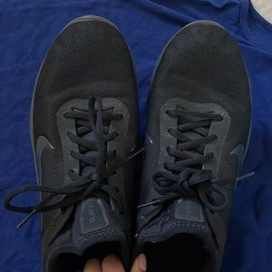 Black Nike workout shoes